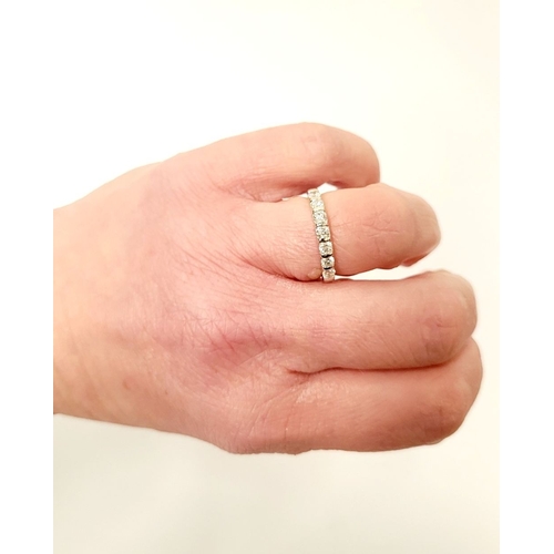 79 - AN 18CT WHITE GOLD 7 STONE HALF ETERNITY DIAMOND RING, the diamonds are a nice bright, ring size: N ... 