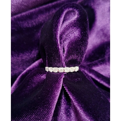 79 - AN 18CT WHITE GOLD 7 STONE HALF ETERNITY DIAMOND RING, the diamonds are a nice bright, ring size: N ... 