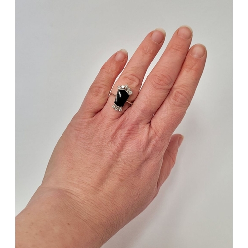 83 - A RARE 18CT GOLD ONYX & DIAMOND RING, set with beautiful sparkling brilliant cut diamonds; approxima... 