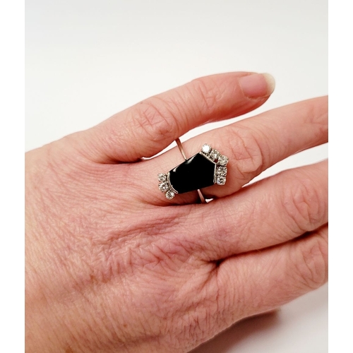 83 - A RARE 18CT GOLD ONYX & DIAMOND RING, set with beautiful sparkling brilliant cut diamonds; approxima... 