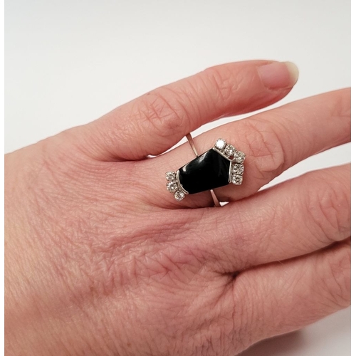 83 - A RARE 18CT GOLD ONYX & DIAMOND RING, set with beautiful sparkling brilliant cut diamonds; approxima... 