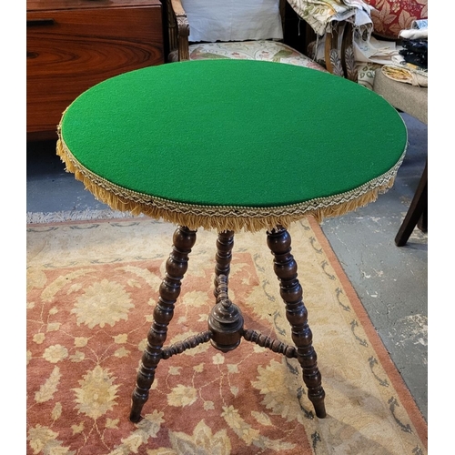 90 - A GOOD QUALITY CIRCULAR ‘GYPSY’ OAK BASED TABLE, with circular green baize covered top finished with... 