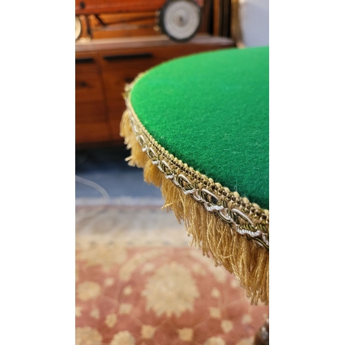 90 - A GOOD QUALITY CIRCULAR ‘GYPSY’ OAK BASED TABLE, with circular green baize covered top finished with... 