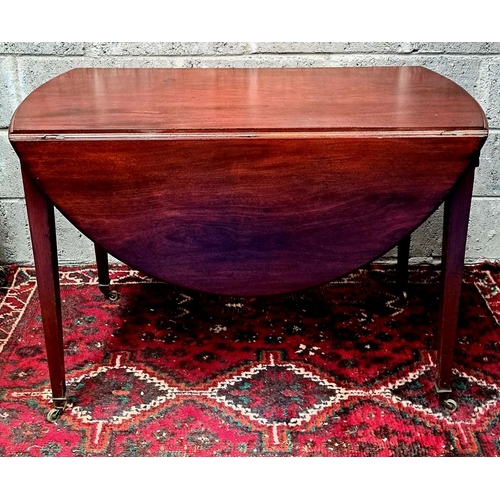 163 - A GEORGIAN STYLE MAHOGANY DROP-LEAF TABLE bevelled edge; cockbeaded drawers with wooden knobs, taper... 