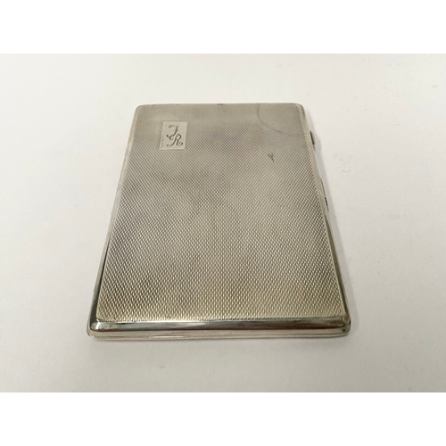 99 - A FINE SILVER CIGARETTE CASE, by Harman Brothers, Spencer Street, Birmingham c.1946. With engine tur... 