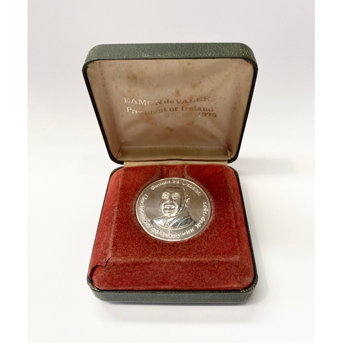 148 - A COMMEMORATIVE EAMON DE VALERA IRISH SILVER MEDALLION, featuring embossed de Valera bust on obverse... 