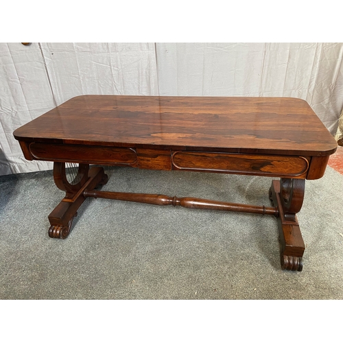 297 - A WILLIAM IV ROSEWOOD LIBRARY TABLE, with two drawers to frieze atop carved lyre supports on pod bas... 