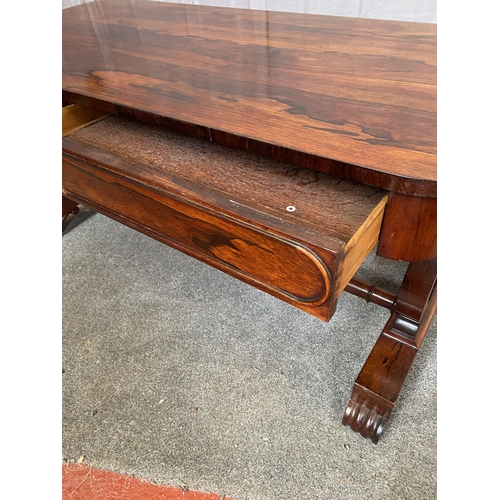 297 - A WILLIAM IV ROSEWOOD LIBRARY TABLE, with two drawers to frieze atop carved lyre supports on pod bas... 