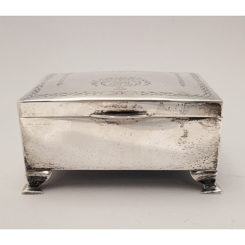 31 - AN EARLY 20TH CENTURY SILVER BOX, with hinged lid, the top decorated with bright cut decoration of r... 