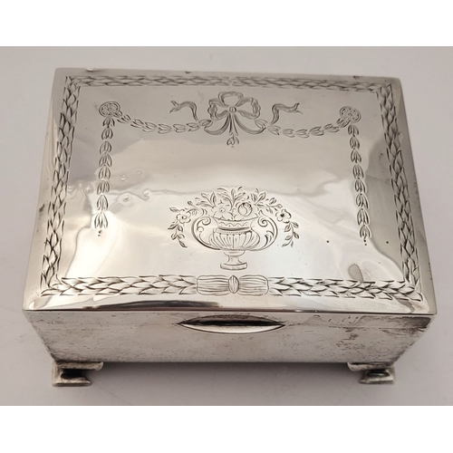 31 - AN EARLY 20TH CENTURY SILVER BOX, with hinged lid, the top decorated with bright cut decoration of r... 