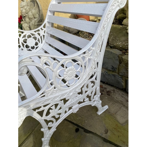 40 - AN EXCELLENT CAST IRON SINGLE GARDEN SEAT, the back with decorative openwork panel in rose pattern s... 