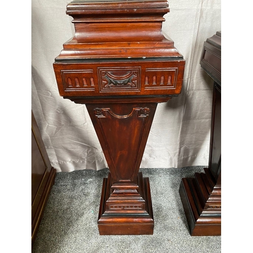 44 - A PAIR OF MAHOGANY ADAMS STYLE PEDESTALS/PLANT STANDS, with decorative carved panel featuring swag d... 