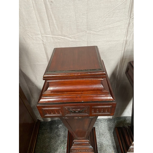 44 - A PAIR OF MAHOGANY ADAMS STYLE PEDESTALS/PLANT STANDS, with decorative carved panel featuring swag d... 