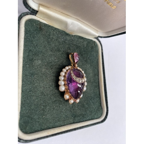 A Beautiful Victorian 15ct Cabochon Amethyst Pendant, Surrounded By 