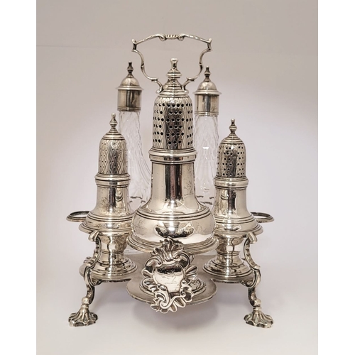 11 - A VERY FINE LATE 18TH CENTURY IRISH SILVER CRUET SET, complete with 2 cut glass bottles, a large sif... 