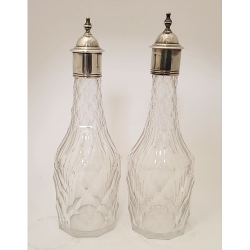 11 - A VERY FINE LATE 18TH CENTURY IRISH SILVER CRUET SET, complete with 2 cut glass bottles, a large sif... 