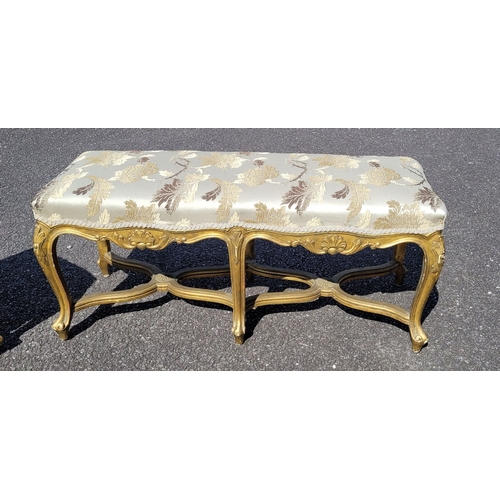 23 - A VERY FINE PAIR OF 19TH CENTURY FRENCH LOUIS XVI STYLE ‘X’ FRAMED GILT WOOD WINDOW SEATS, each with... 