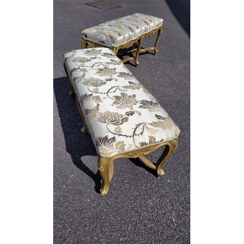 23 - A VERY FINE PAIR OF 19TH CENTURY FRENCH LOUIS XVI STYLE ‘X’ FRAMED GILT WOOD WINDOW SEATS, each with... 