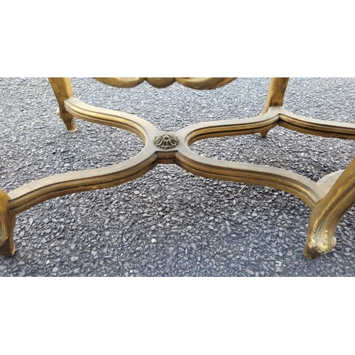 23 - A VERY FINE PAIR OF 19TH CENTURY FRENCH LOUIS XVI STYLE ‘X’ FRAMED GILT WOOD WINDOW SEATS, each with... 