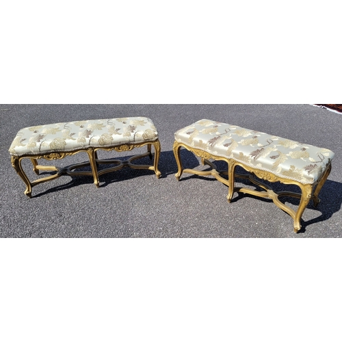 23 - A VERY FINE PAIR OF 19TH CENTURY FRENCH LOUIS XVI STYLE ‘X’ FRAMED GILT WOOD WINDOW SEATS, each with... 