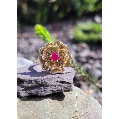 53 - A BESPOKE 14CT YELLOW GOLD PINK SAPPHIRE & DIAMOND FLORAL RING, very pretty design; the central peta... 