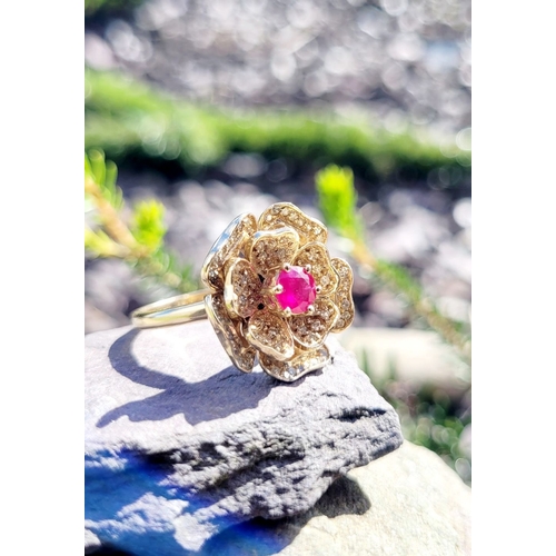 53 - A BESPOKE 14CT YELLOW GOLD PINK SAPPHIRE & DIAMOND FLORAL RING, very pretty design; the central peta... 