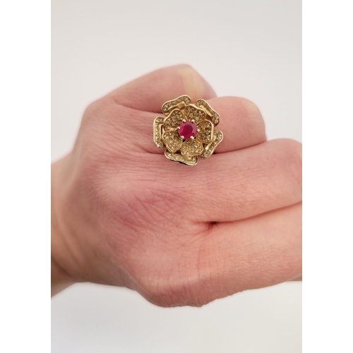 53 - A BESPOKE 14CT YELLOW GOLD PINK SAPPHIRE & DIAMOND FLORAL RING, very pretty design; the central peta... 