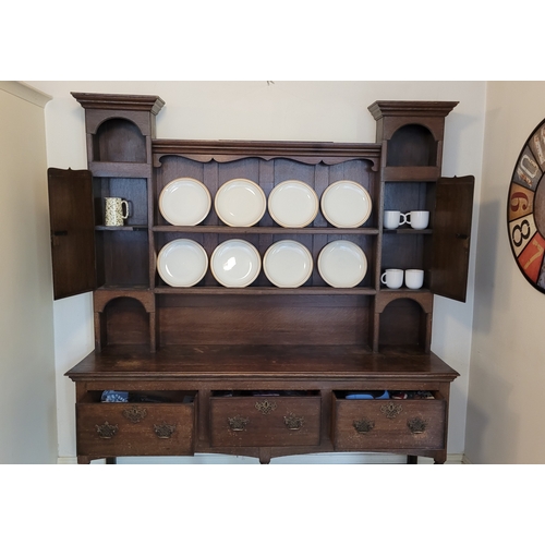 30 - AN 18TH CENTURY OAK WELSH DRESSER – this is a wonderful example of this piece of furniture, to the b... 