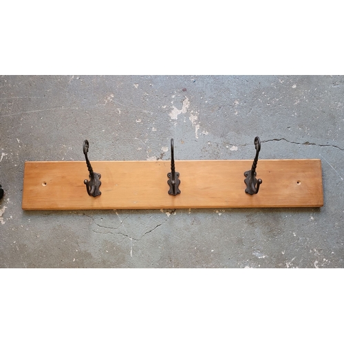 105 - PINE BACKED HEAVY CAST THREE HOOK COAT HANGER PANEL – add detail. 15 x 12 x 84.5cm (H x D x W)