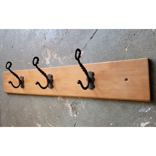 105 - PINE BACKED HEAVY CAST THREE HOOK COAT HANGER PANEL – add detail. 15 x 12 x 84.5cm (H x D x W)