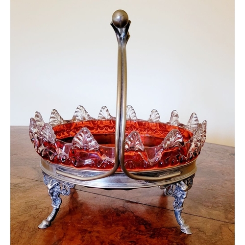 116 - A LATE 19TH CENTURY VICTORIAN BRASS FRAMED RUBY GLASS BOWL, the bowl with rich ruby red colour and c... 