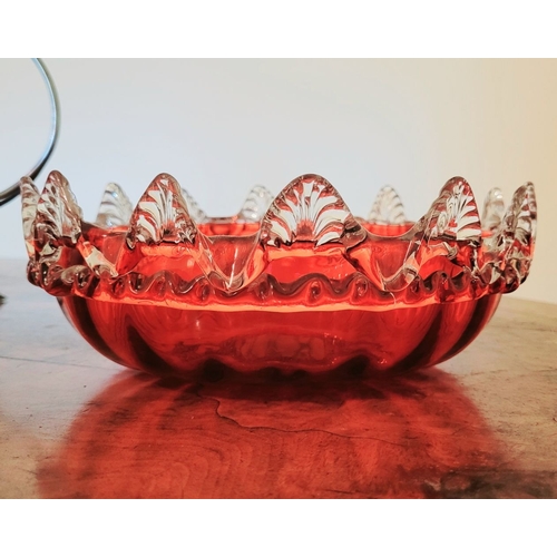 116 - A LATE 19TH CENTURY VICTORIAN BRASS FRAMED RUBY GLASS BOWL, the bowl with rich ruby red colour and c... 