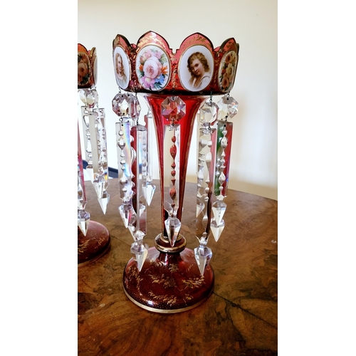 119 - A FANTASTIC PAIR OF 19TH CENTURY RUBY GLASS & ENAMEL LUSTRES, each with picture panels to the top de... 