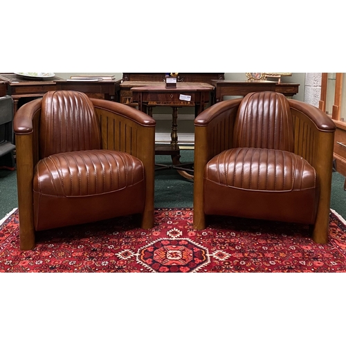 12 - AN EXCELLENT PAIR OF QUALITY BROWN LEATHER ‘AVIATOR’ CLUB ARMCHAIRS, these chairs are designed in th... 