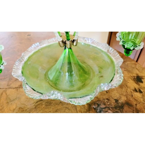 120 - A FANTASTIC VICTORIAN GREEN & CLEAR GLASS EPERGNE, with a central tall flute and three small trumpet... 