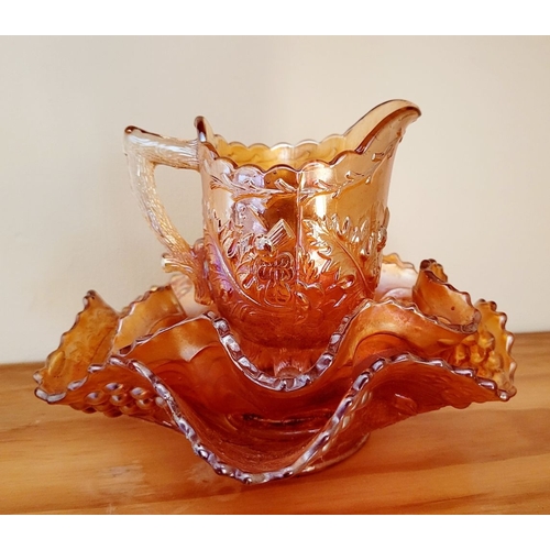 125 - SET OF THREE EARLY 20TH CENTURY CARNIVAL WARE GLASS ITEMS, all in amber colour includes a Jug, a lar... 