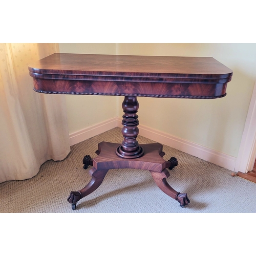 21 - A VERY FINE REGENCY STYLE FLAME MAHOGANY FOLD OVER TEA TABLE, with rounded corners to the front fini... 