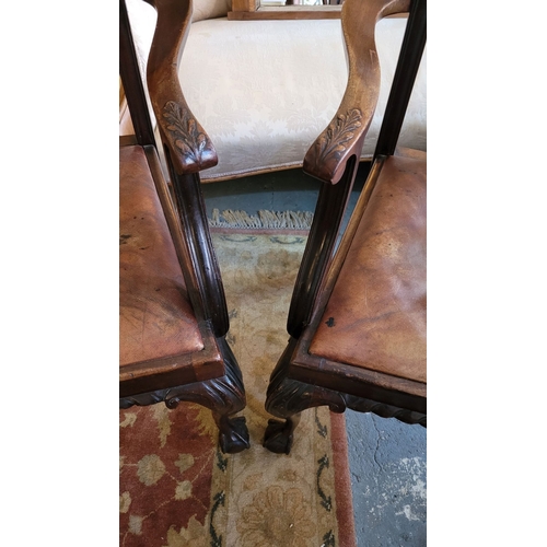 22 - A HANDSOME PAIR OF FINELY MADE CHIPPENDALE STYLE CARVER ARMCHAIRS, each with a shaped crest rail hav... 