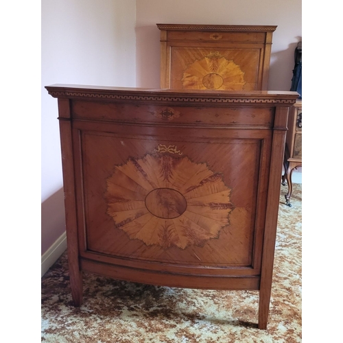 36 - A PAIR OF ANTIQUE MAHOGANY INLAID ANTIQUE BEDS: Each bed with a slightly bow shaped foot board with ... 