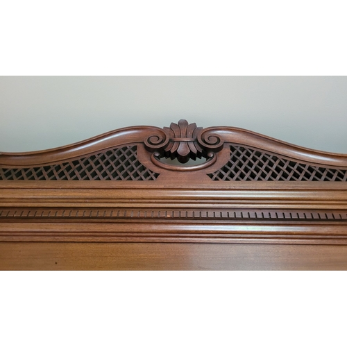 38 - A VERY LARGE VICTORIAN WALNUT ARMOIRE / WARDROBE UNITE, with a raised carved pediment top, to the le... 