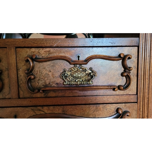 38 - A VERY LARGE VICTORIAN WALNUT ARMOIRE / WARDROBE UNITE, with a raised carved pediment top, to the le... 