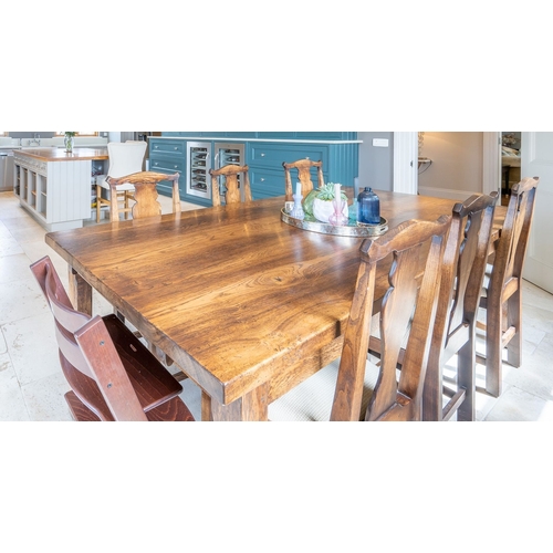 56 - A GOOD SET OF SIX COUNTRY STYLE DINING CHAIRS, each with a shaped splat back support with scroll edg... 