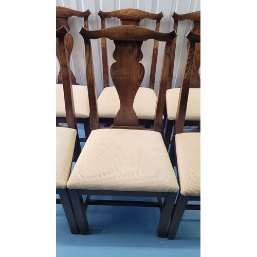 56 - A GOOD SET OF SIX COUNTRY STYLE DINING CHAIRS, each with a shaped splat back support with scroll edg... 