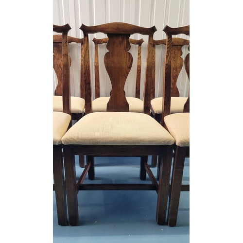 56 - A GOOD SET OF SIX COUNTRY STYLE DINING CHAIRS, each with a shaped splat back support with scroll edg... 