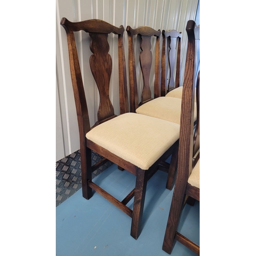 56 - A GOOD SET OF SIX COUNTRY STYLE DINING CHAIRS, each with a shaped splat back support with scroll edg... 