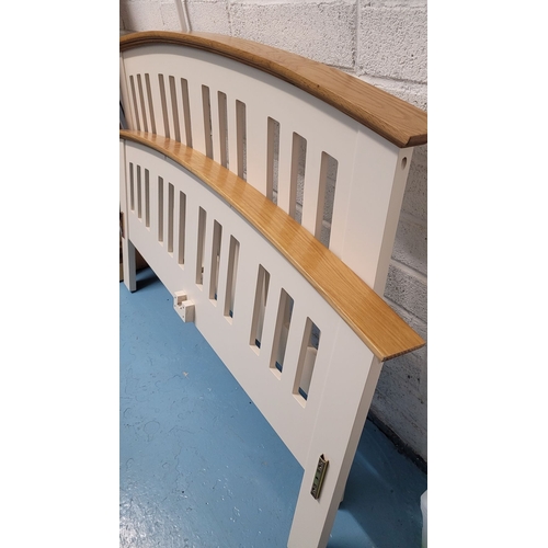 58 - A VERY GOOD QUALITY OAK & PAINTED WOOD BED, with curved head board & foot board having open slat det... 