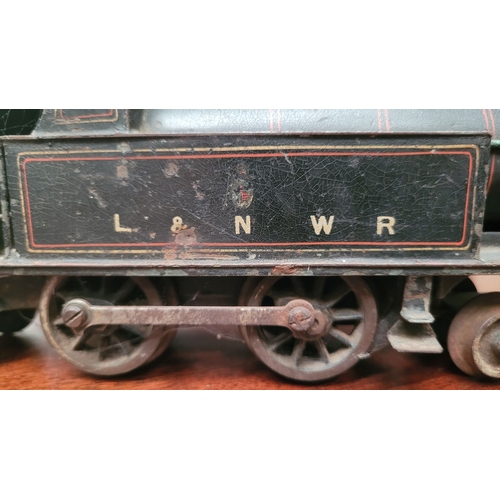 64 - TWO ANTIQUE TOY TRAIN / MODEL TRAIN PIECES: (i) A CLOCKWORK LOCOMOTIVE –maker not confirmed – possib... 