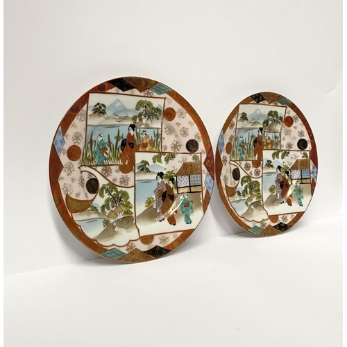 69 - A PAIR OF JAPANESE KUTANI PORCELAIN PAINTED PLATES, each featuring hand-painted picture panels depic... 