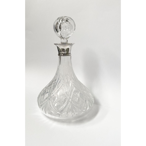 72 - A SILVER COLLARED CUT GLASS SHIPS DECANTER, Hallmarked Maker David Shaw Silverware Ltd, Clerkenwell ... 