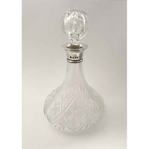 72 - A SILVER COLLARED CUT GLASS SHIPS DECANTER, Hallmarked Maker David Shaw Silverware Ltd, Clerkenwell ... 